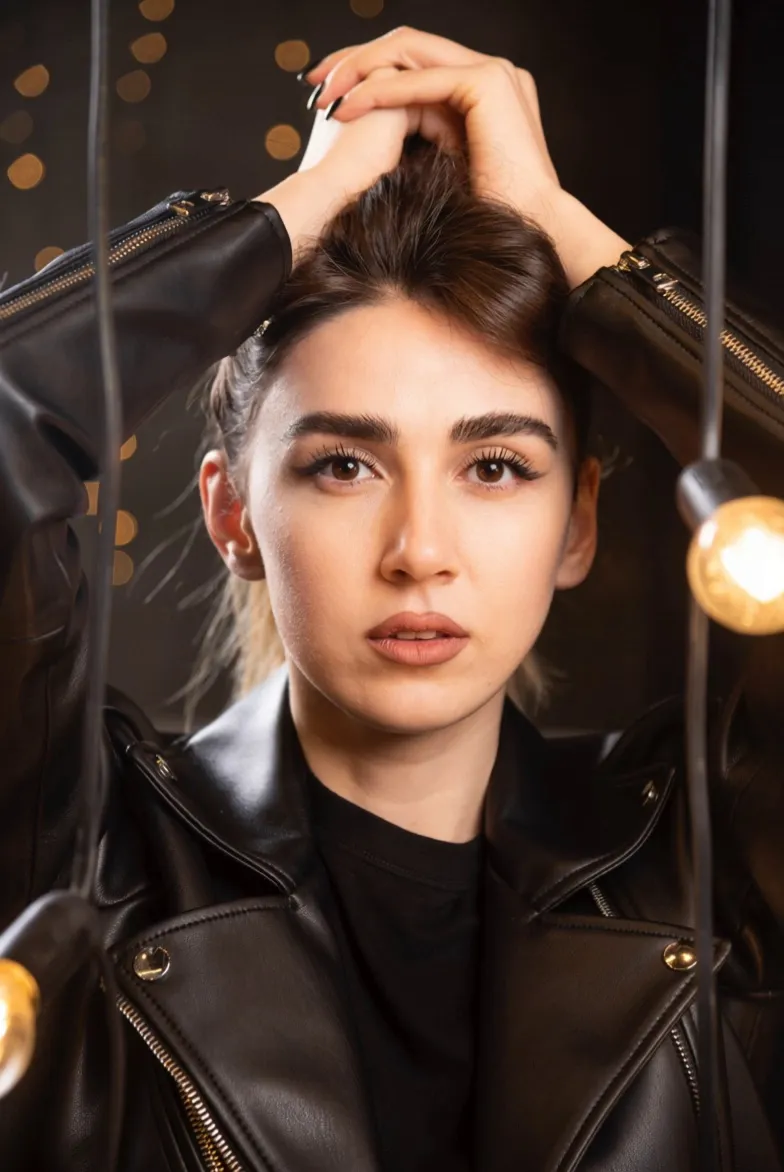 character transformed into a swirling mass of colorful, reflective marbles